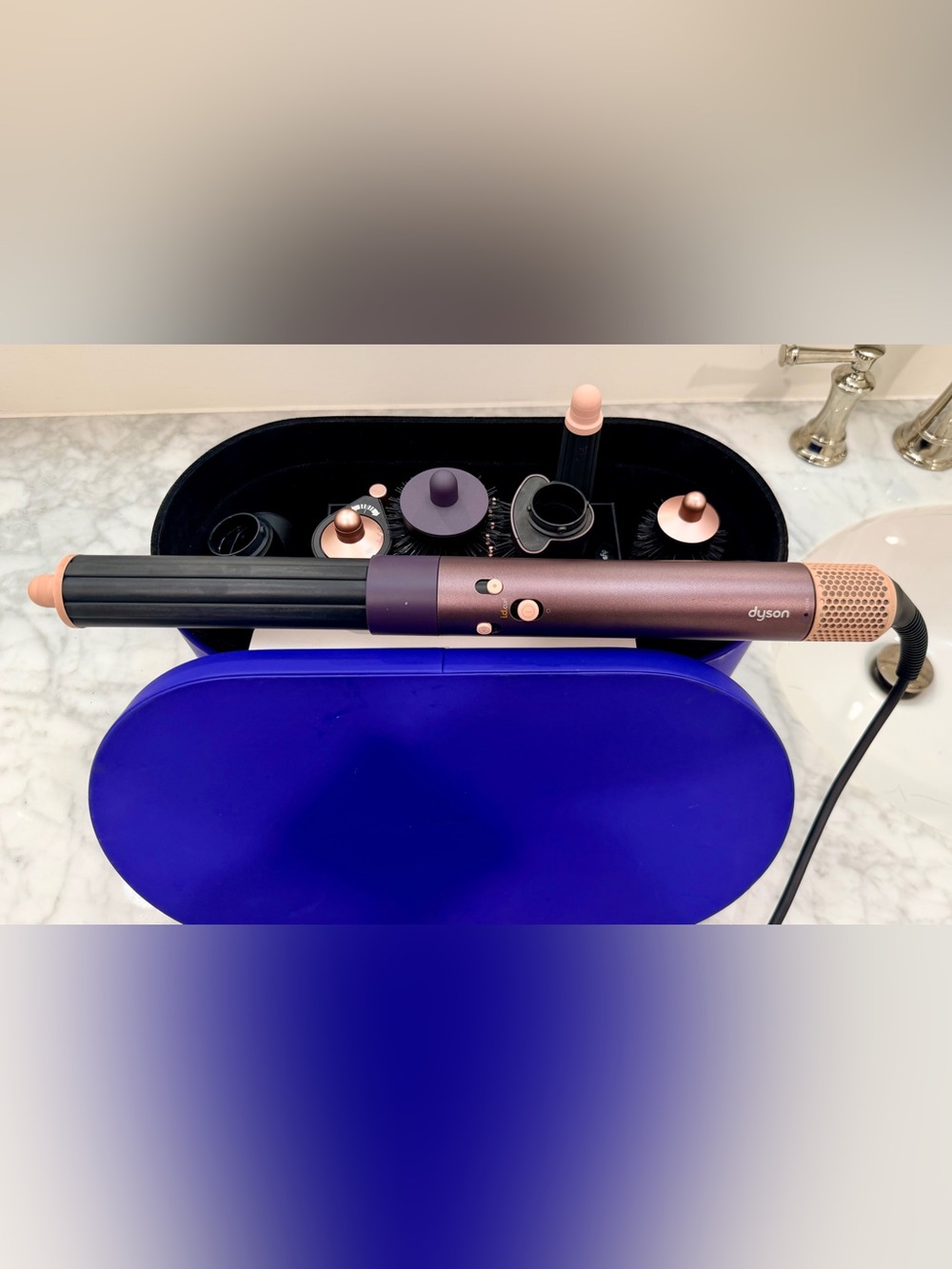Dyson multi-styler in purple and rose gold